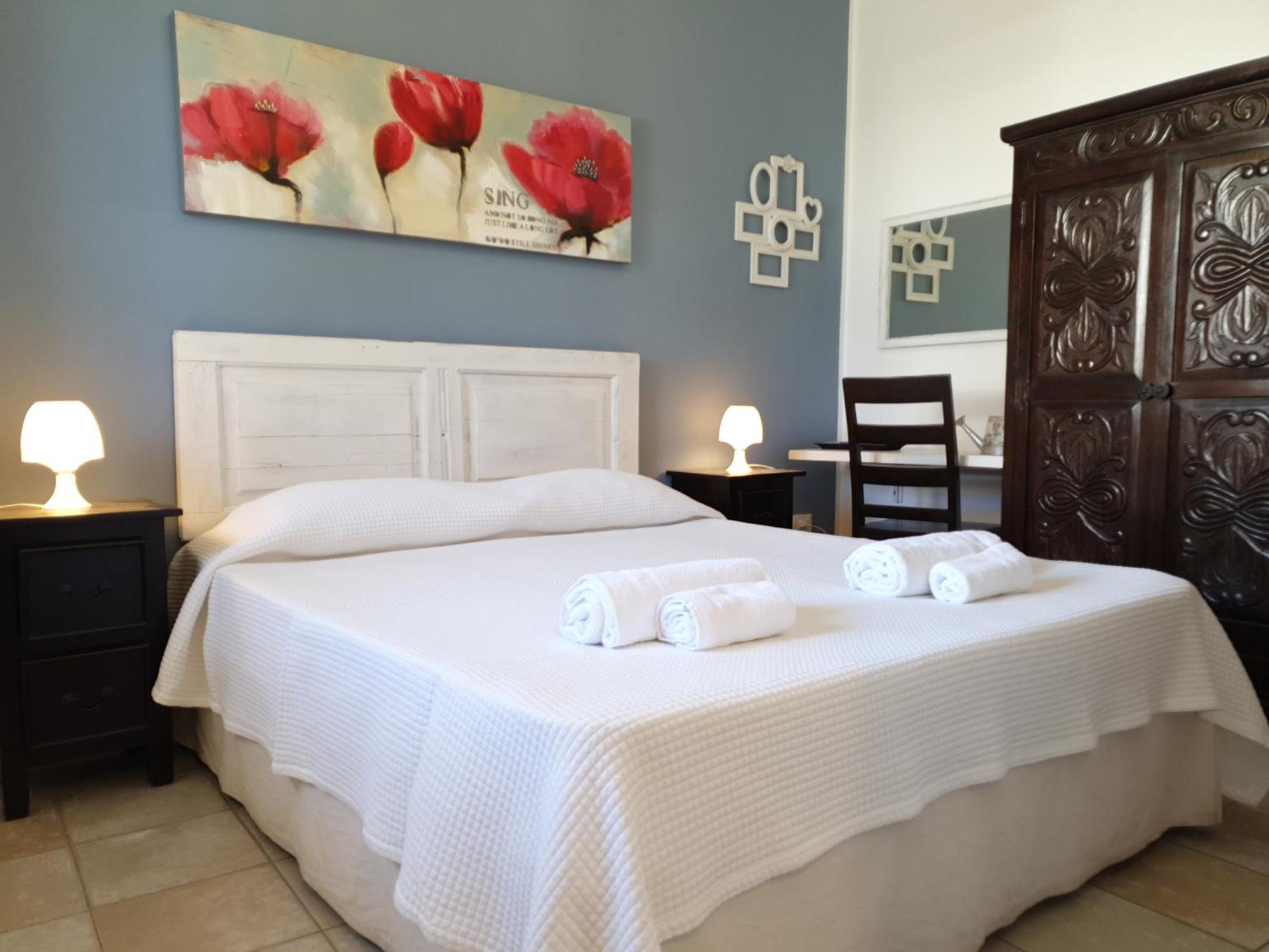 Blue Dolphin Guest House Альгеро Экстерьер фото