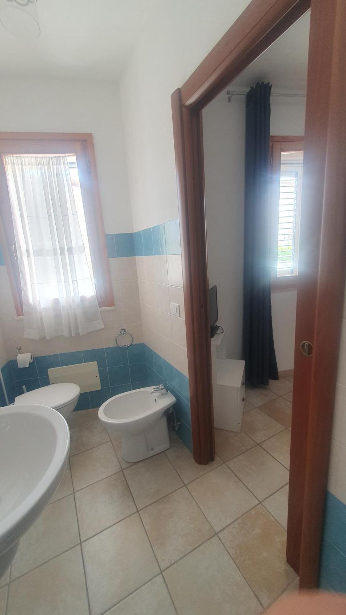 Blue Dolphin Guest House Альгеро Экстерьер фото