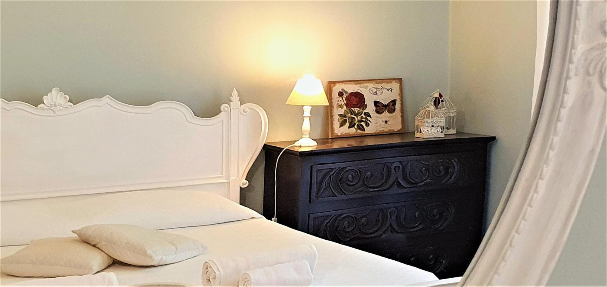 Blue Dolphin Guest House Альгеро Экстерьер фото